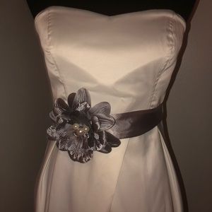 Ivory satin dress with gray flower belt
